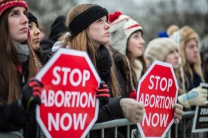WASHINGTON, DC - JANUARY 25: Anti-abortion protesters attend the March for Life on January 25, 2013 in Washington, DC. The pro-life gathering is held each year around the anniversary of the Roe v. Wade Supreme Court decision. (Photo by Brendan Hoffman/Getty Images)